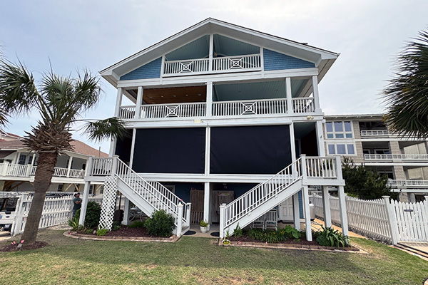 hurricane screens installed on a beach property