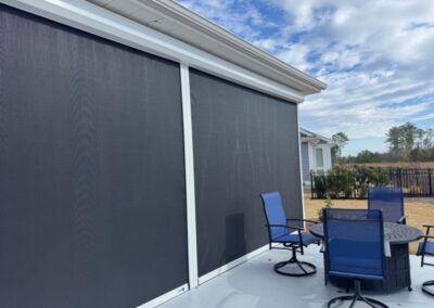 Rolled down motorized hurricane screens in Leland NC