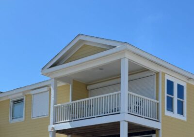 Large white roll down hurricane shutter in Carolina Beach