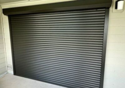 Hurricane Shutters in Wrightstville Beach covering a sliding door